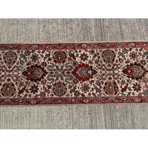 497 - A 6.2m long x 69 cm wide carpet, a good condition hall runner.


This lot is collection only