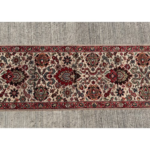 497 - A 6.2m long x 69 cm wide carpet, a good condition hall runner.


This lot is collection only