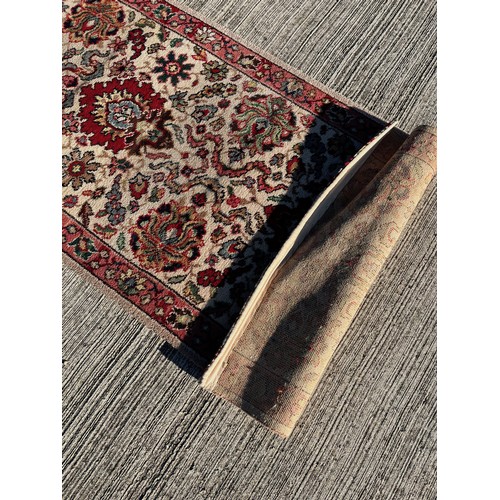 497 - A 6.2m long x 69 cm wide carpet, a good condition hall runner.


This lot is collection only