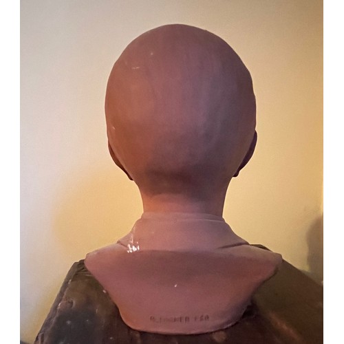 498 - Terracotta bust of a gentleman.

This lot is available for in-house shipping