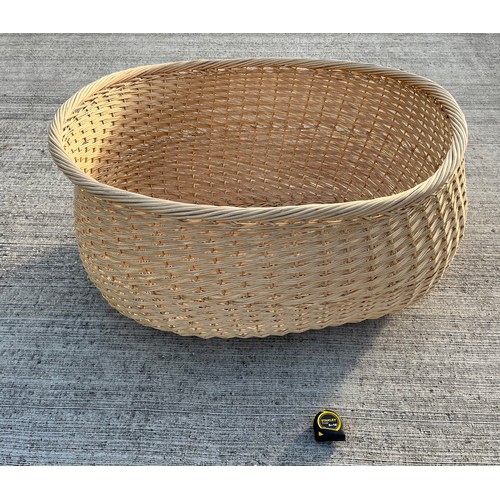 344 - A massive wicker storage basket, 91 cm x 107 cm x 53 cm deep, make a great dog bed.

This lot is col... 