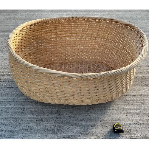 344 - A massive wicker storage basket, 91 cm x 107 cm x 53 cm deep, make a great dog bed.

This lot is col... 