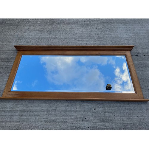 348 - A very large oak framed bevel edged wall mirror 220 cm long 101 cm high.

This lot is collection onl... 