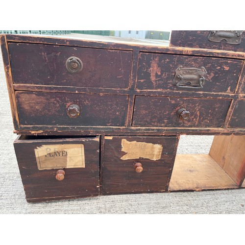 349 - Industrial wooden furniture, two sets of workshop storage drawers, and parts a shown in the photogra... 