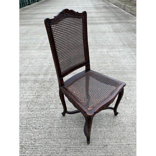 352 - Classical bergere side chair with carved decoration and a cross stretcher support. 49 cm wide 45 cm ... 