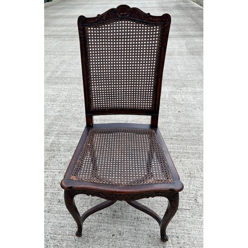 352 - Classical bergere side chair with carved decoration and a cross stretcher support. 49 cm wide 45 cm ... 