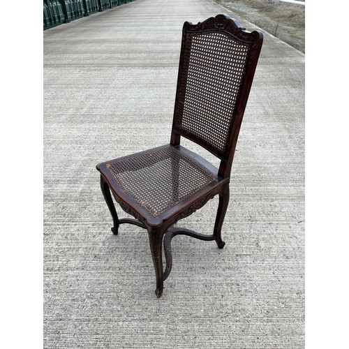 352 - Classical bergere side chair with carved decoration and a cross stretcher support. 49 cm wide 45 cm ... 