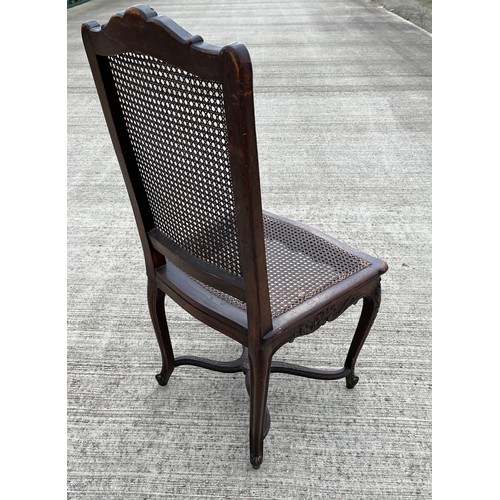 352 - Classical bergere side chair with carved decoration and a cross stretcher support. 49 cm wide 45 cm ... 