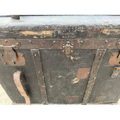 353 - C19th metal and wood bound storage trunk by Amand Pasquier of Paris. 72 cm x 43 cm x 59 cm high.

Th... 