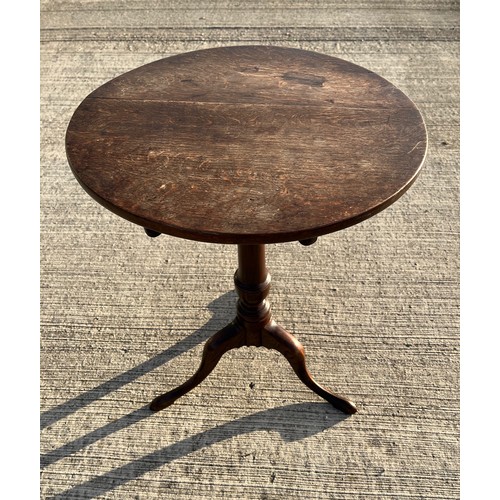 357 - Mahogany tilt top circular topped side table, 50 cm in diameter, 69 cm tall.

This lot is collection... 