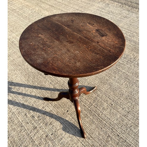 357 - Mahogany tilt top circular topped side table, 50 cm in diameter, 69 cm tall.

This lot is collection... 