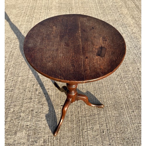 357 - Mahogany tilt top circular topped side table, 50 cm in diameter, 69 cm tall.

This lot is collection... 