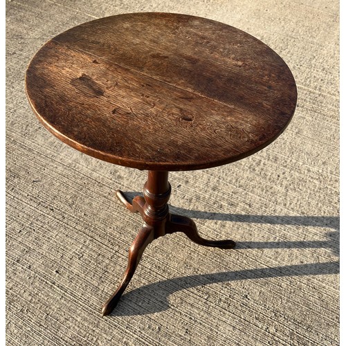 357 - Mahogany tilt top circular topped side table, 50 cm in diameter, 69 cm tall.

This lot is collection... 