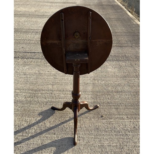 357 - Mahogany tilt top circular topped side table, 50 cm in diameter, 69 cm tall.

This lot is collection... 