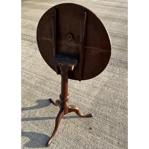 357 - Mahogany tilt top circular topped side table, 50 cm in diameter, 69 cm tall.

This lot is collection... 