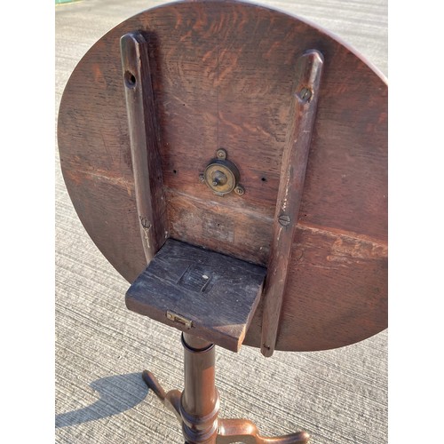 357 - Mahogany tilt top circular topped side table, 50 cm in diameter, 69 cm tall.

This lot is collection... 