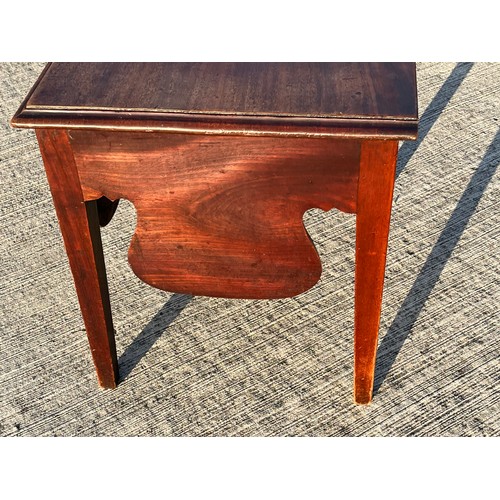 362 - Mahogany storage table with a hinged top accessing a storage area,  51 cm x 43 cm x 49 cm high.