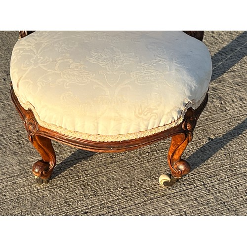 364 - Upholstered C19th bedroom or nursing chair with carved decoration.

This lot is collection only