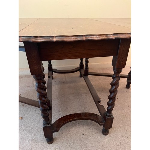 365 - Edwardian drop leaf dinning table with a pie crust edging design to the top and raised on barley twi... 