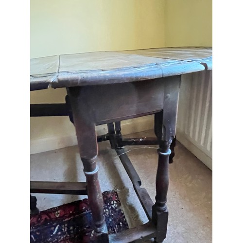 367 - C19th drop leaf circular topped dinning table with carved decoration.

This lot is collection only