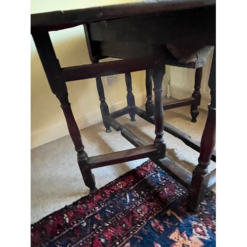 367 - C19th drop leaf circular topped dinning table with carved decoration.

This lot is collection only