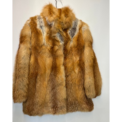 371 - Ladies fur coat marked for German fashion house.

This lot is available for in-house shipping