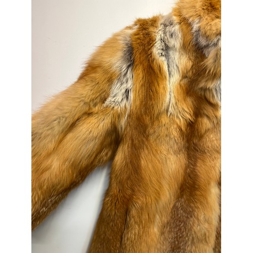 371 - Ladies fur coat marked for German fashion house.

This lot is available for in-house shipping