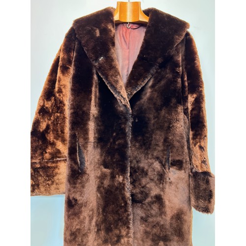 373 - Ladies full length fur coat.

This lot is available for in-house shipping