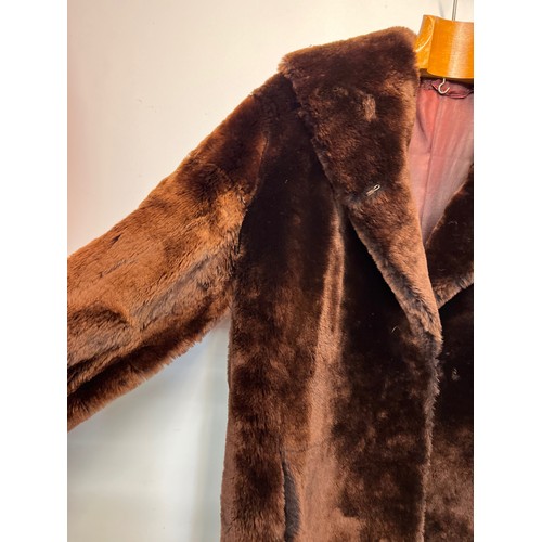 373 - Ladies full length fur coat.

This lot is available for in-house shipping