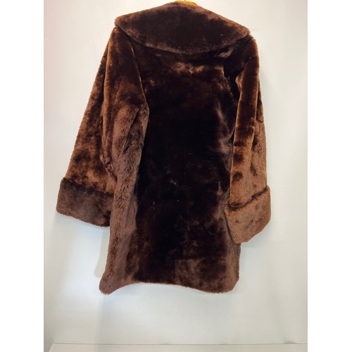 373 - Ladies full length fur coat.

This lot is available for in-house shipping