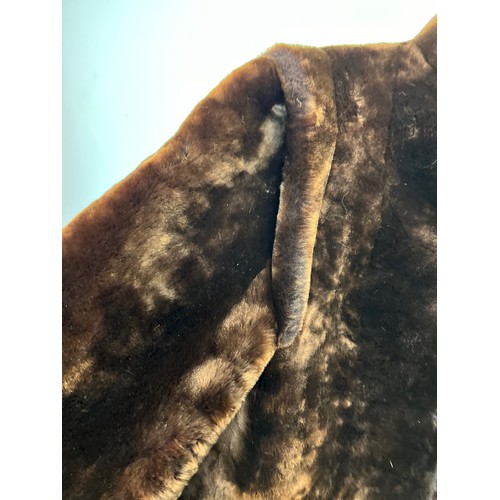 374 - Ladies fur coat size 46.

This lot is available for in-house shipping