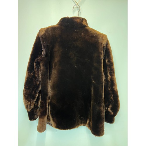 374 - Ladies fur coat size 46.

This lot is available for in-house shipping