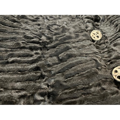 376 - Ladies full length fur coat, marked for south west African lamb, Swiss furriers mark.

This lot is a... 