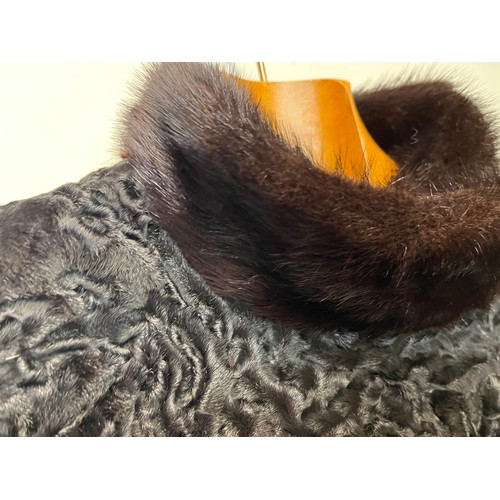 376 - Ladies full length fur coat, marked for south west African lamb, Swiss furriers mark.

This lot is a... 