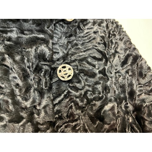 376 - Ladies full length fur coat, marked for south west African lamb, Swiss furriers mark.

This lot is a... 