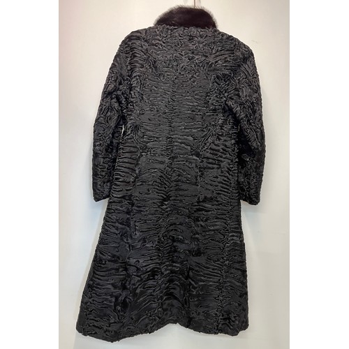 376 - Ladies full length fur coat, marked for south west African lamb, Swiss furriers mark.

This lot is a... 