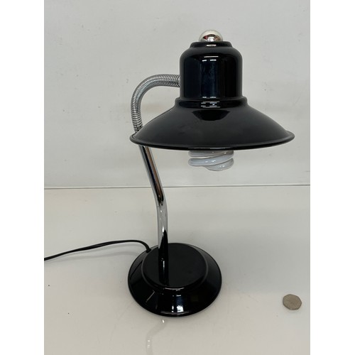 17 - Mid century furniture, an adjustable desk lamp with enamelled steel shade and base.

This lot is ava... 