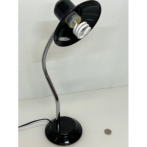 17 - Mid century furniture, an adjustable desk lamp with enamelled steel shade and base.

This lot is ava... 