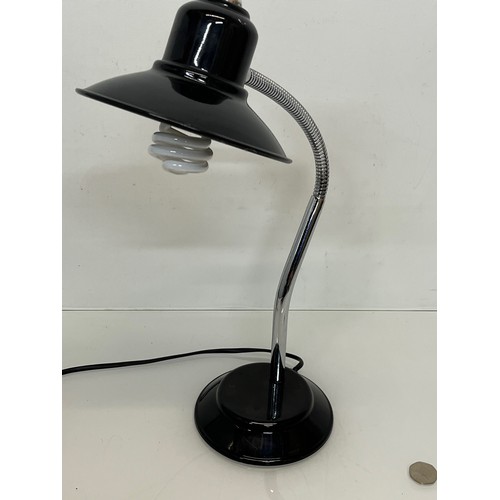 17 - Mid century furniture, an adjustable desk lamp with enamelled steel shade and base.

This lot is ava... 