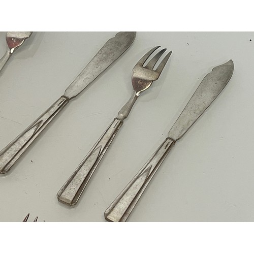 18 - Mid century cutlery, flat wares, a set of hall marked and with a registered design mark, art deco fi... 