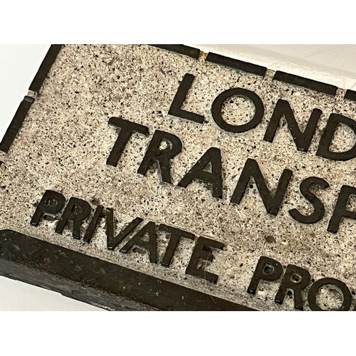 19 - Railwayana, a cast brass tile / brick insert for London Transport.

This lot is available for in-hou... 