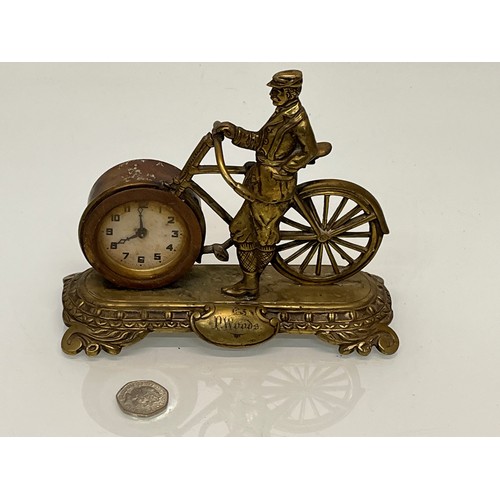 27 - A veteran era cycling themed mantle clock, marked for P woods.

This lot is available for in-house s... 