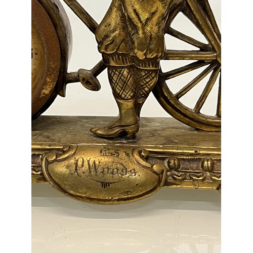 27 - A veteran era cycling themed mantle clock, marked for P woods.

This lot is available for in-house s... 