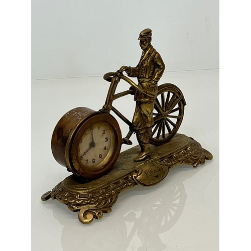 27 - A veteran era cycling themed mantle clock, marked for P woods.

This lot is available for in-house s... 