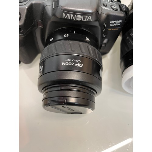 48 - Digital photography and digital filming, bagged cameras and lenses, Minolta etc.

This lot is availa... 