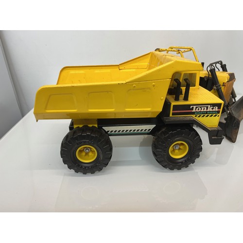 51 - Tonka toys, tinplate models a dump truck and a bulldozer.

This lot is available for in-house shippi... 