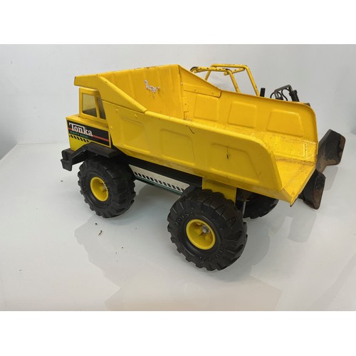 51 - Tonka toys, tinplate models a dump truck and a bulldozer.

This lot is available for in-house shippi... 