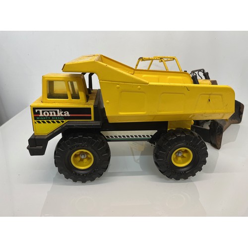 51 - Tonka toys, tinplate models a dump truck and a bulldozer.

This lot is available for in-house shippi... 