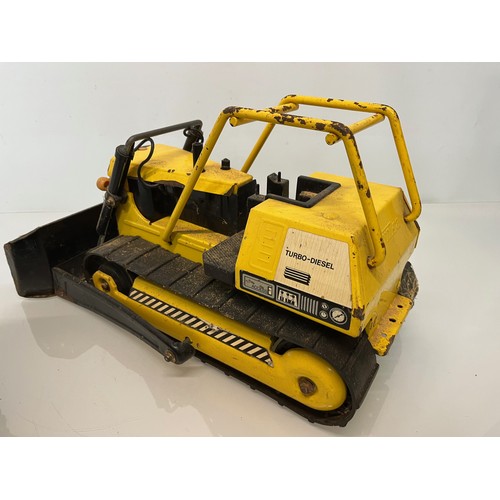 51 - Tonka toys, tinplate models a dump truck and a bulldozer.

This lot is available for in-house shippi... 