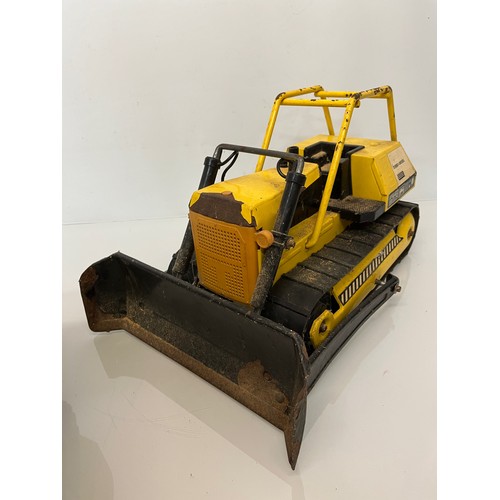 51 - Tonka toys, tinplate models a dump truck and a bulldozer.

This lot is available for in-house shippi... 